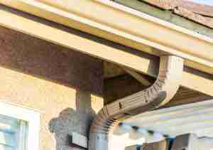 Seamless rain gutters on home