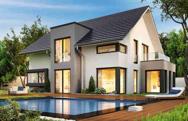 Residential home with metal roof and seamless gutters